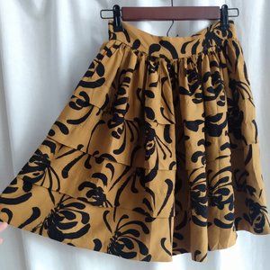 pleated, layered Anthropologie skirt. 26 inch waist. HAS POCKETS